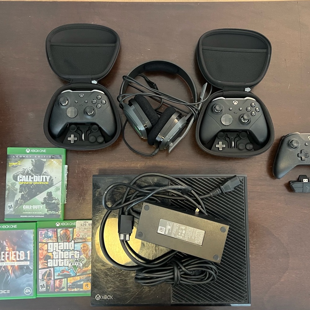 XBOX ONE with TWO XBOX ELITE CONTROLLERS
AND THREE GAMES AND ASTRO A 10 HEADSET